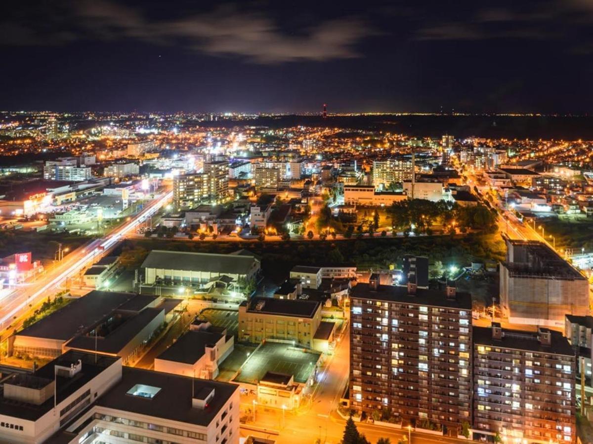 Hotel Emisia Sapporo Exterior photo Aerial view of the city at night