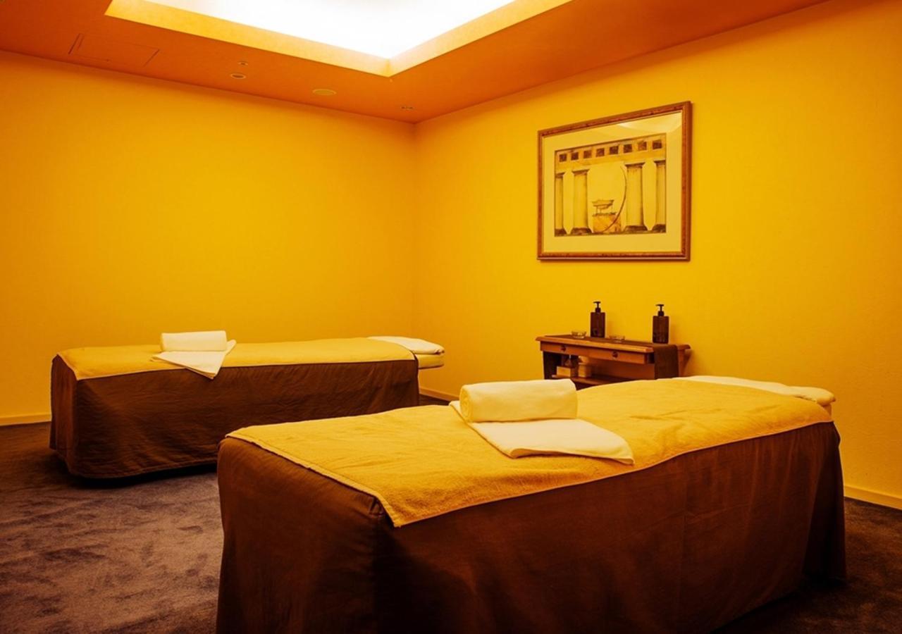 Hotel Emisia Sapporo Exterior photo A massage room at a spa